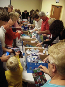 Volunteers packing boxes